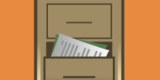 brown file cabinet with one open drawer and paper popping out